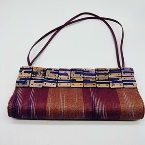 boutique style handmade cloth handbag with abstract painted wooded accent